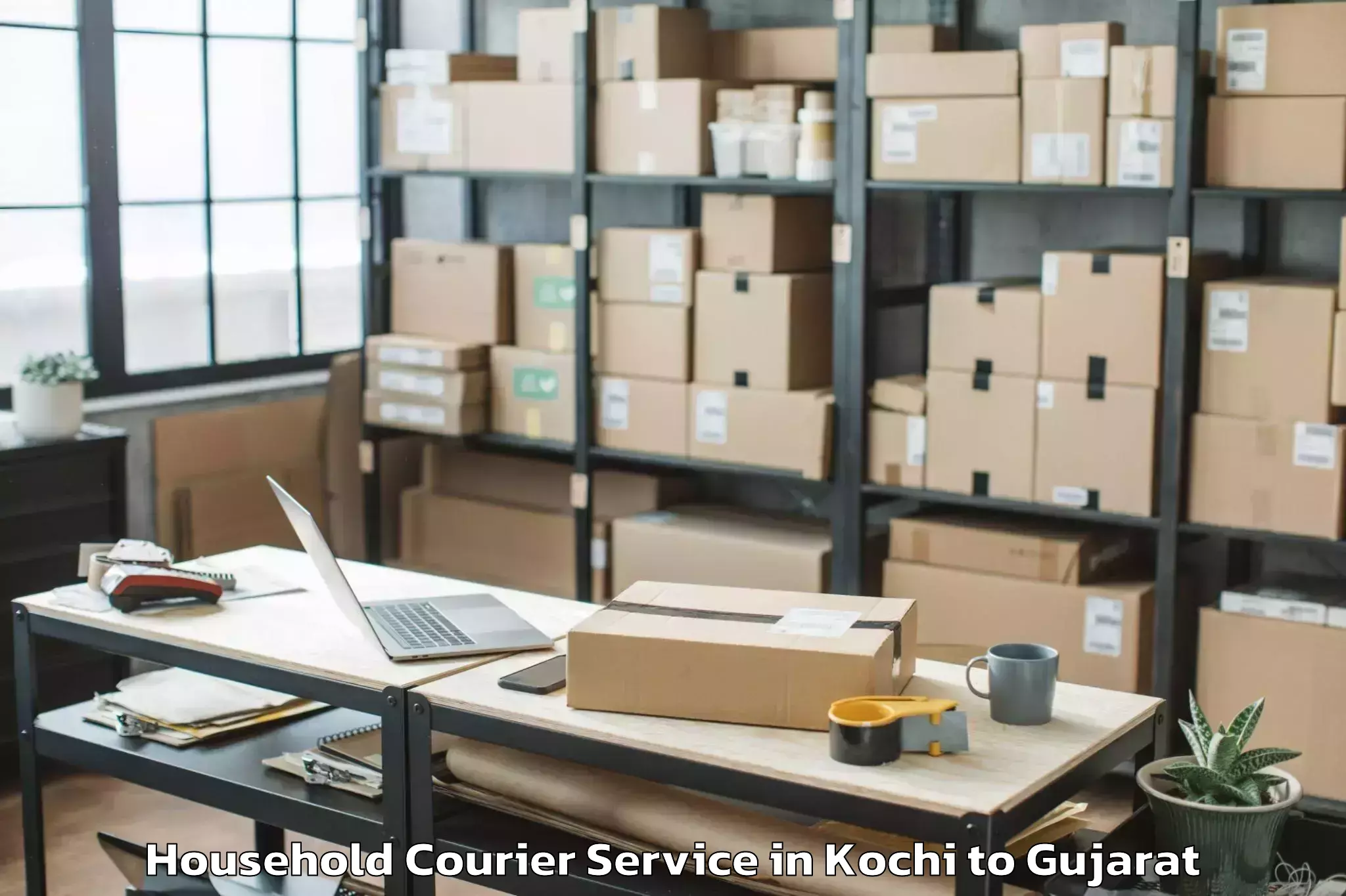 Easy Kochi to Crystal Mall Rajkot Household Courier Booking